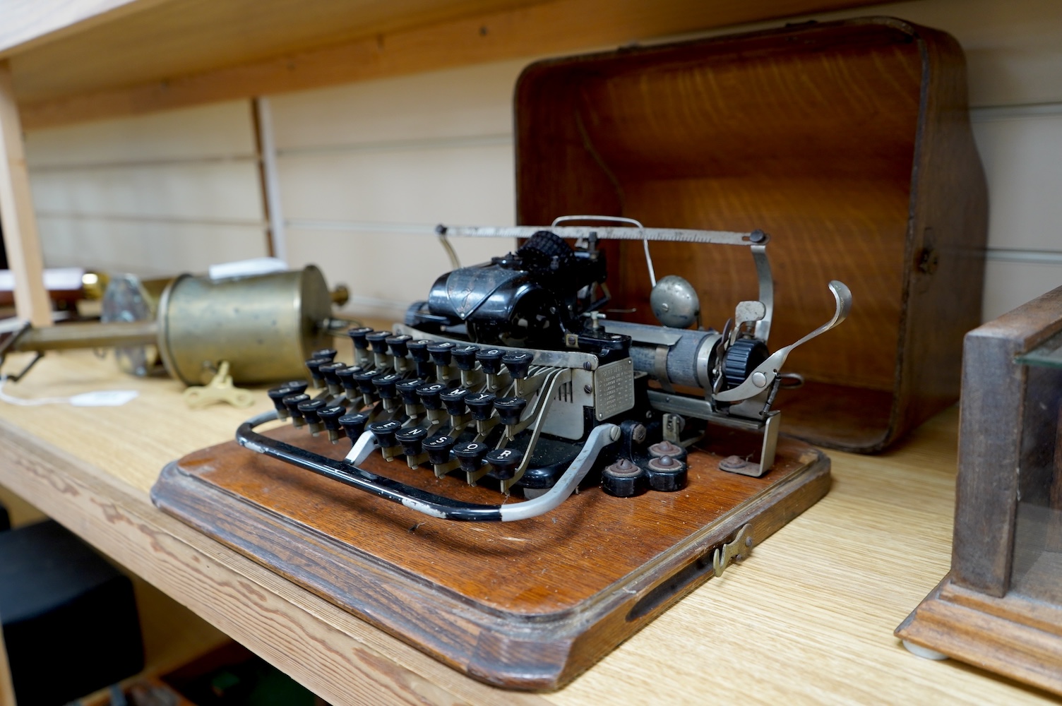 A late 19th century Blickensderfer Newcastle-on-Tyne, manual typewriter, model No.7, in an oak case with oak plywood cover, Made in the USA. Condition - fair to good, the action appears to move smoothly. There are some r